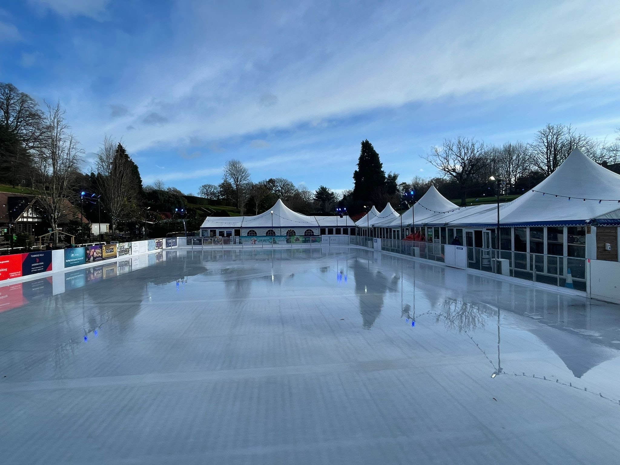 Winter Ice Rink at Royal Tunbridge Wells. The ice is empty and it is a beautiful day. 